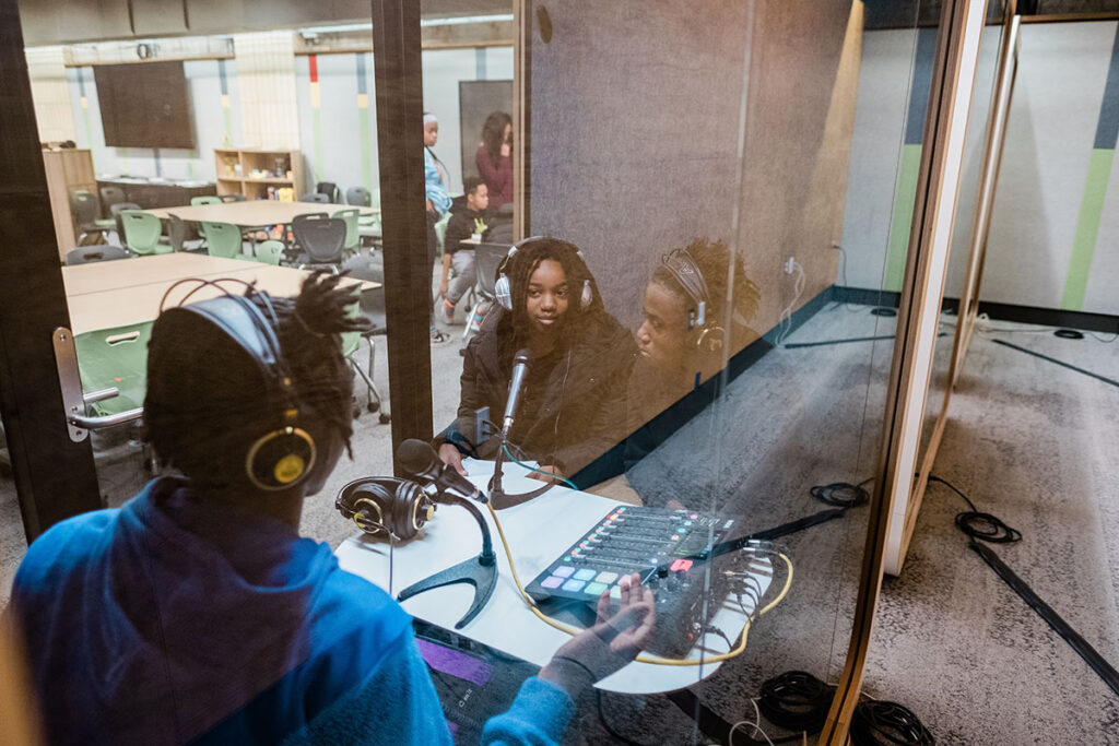 Students at Manchester Academic Charter School record in an SLB audio booth as part of a Moonshot Grant project