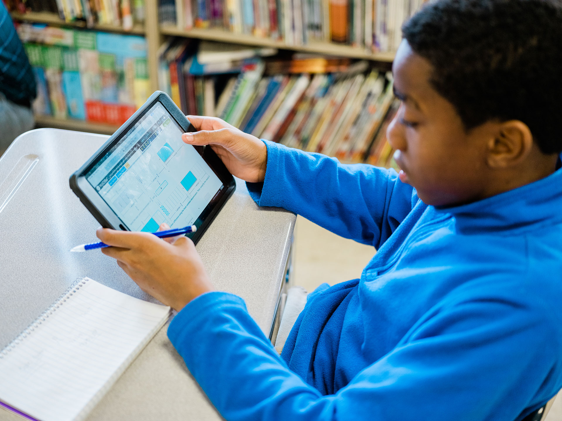 A student at Propel Homestead uses learning software to stretch their math skills. / Photo by Ben Filio