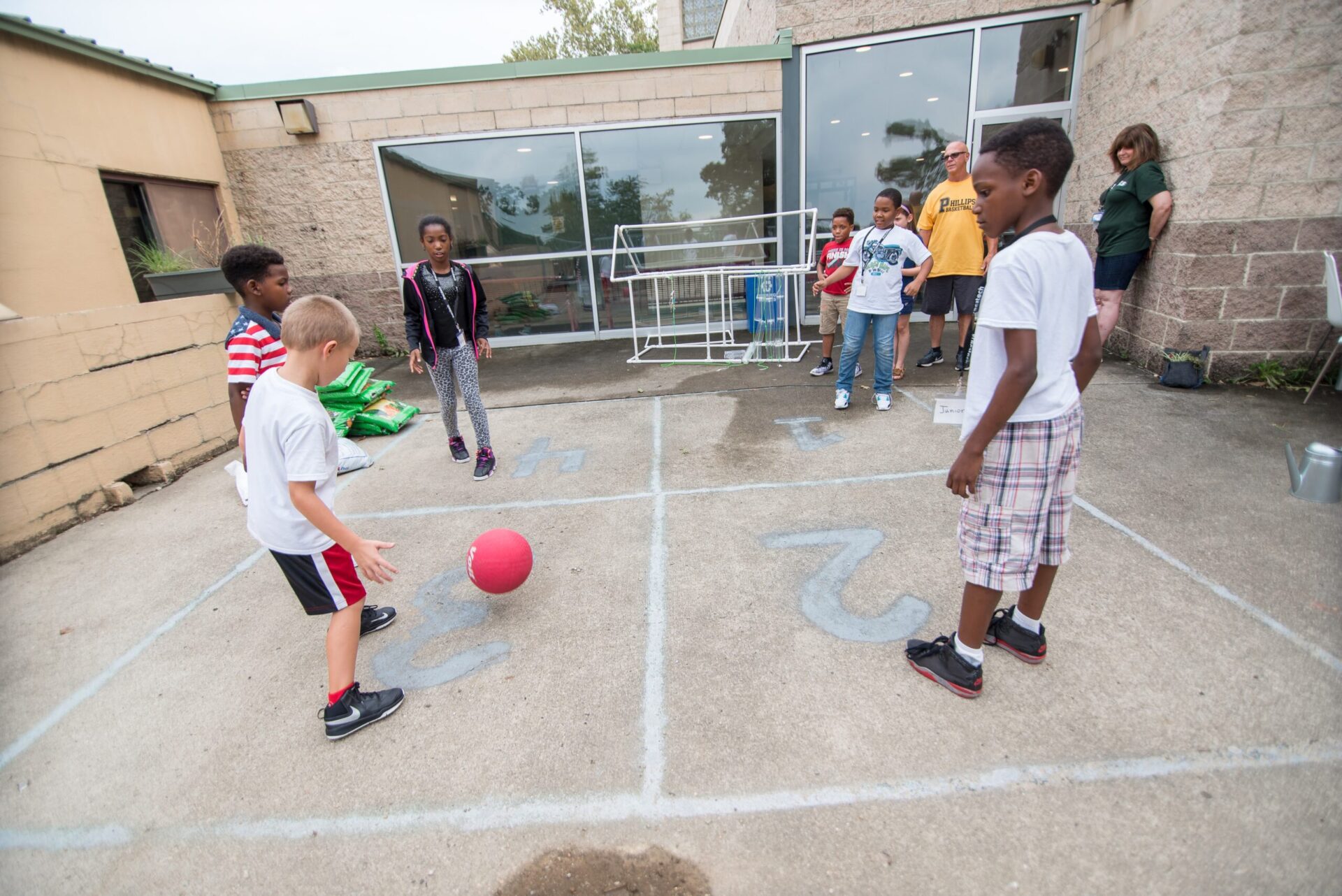 Kids playing kickball