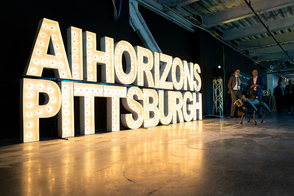 A lighted sign spelling out AI Horizons Pittsburgh.